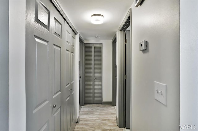 915 Sugar Lake Ct Unit 4, Saint Peters, MO 63376 - corridor with light wood-type flooring