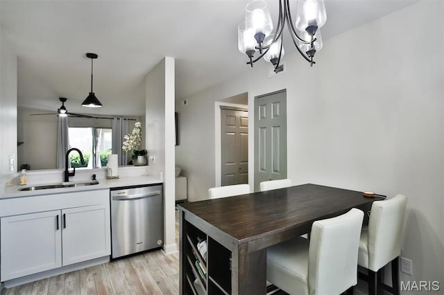915 Sugar Lake Ct Unit 4, Saint Peters, MO 63376 - kitchen with dishwasher, a sink, a chandelier, light wood-type flooring, and white cabinetry