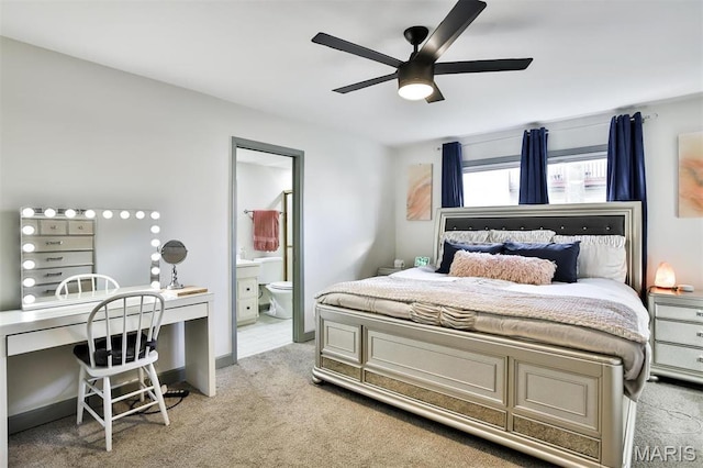 915 Sugar Lake Ct Unit 4, Saint Peters, MO 63376 - carpeted bedroom with connected bathroom, ceiling fan, and an office area