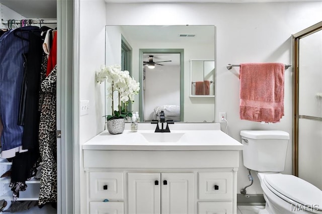 915 Sugar Lake Ct Unit 4, Saint Peters, MO 63376 - full bathroom with ceiling fan, vanity, toilet, and ensuite bath
