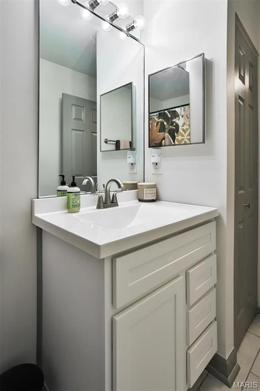 915 Sugar Lake Ct Unit 4, Saint Peters, MO 63376 - bathroom with vanity and tile patterned flooring
