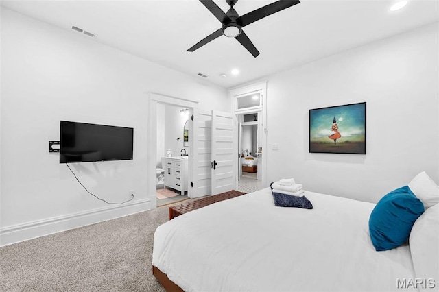 3223 Geyer Ave, Saint Louis, MO 63104 - carpeted bedroom featuring recessed lighting, connected bathroom, ceiling fan, and baseboards