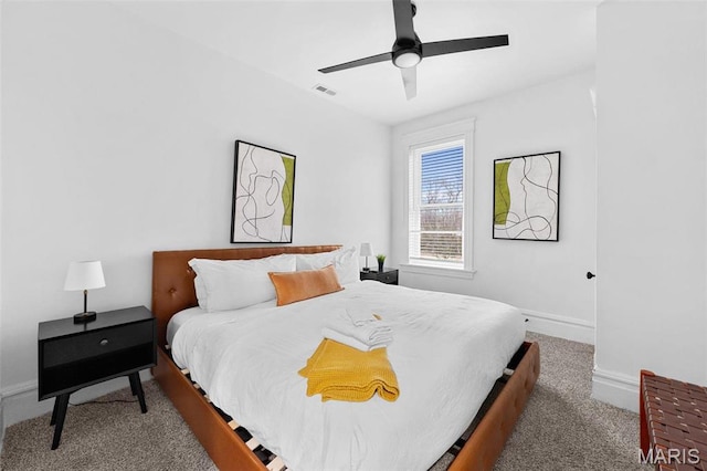 3223 Geyer Ave, Saint Louis, MO 63104 - carpeted bedroom featuring baseboards and ceiling fan