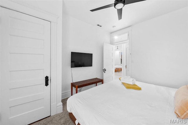 3223 Geyer Ave, Saint Louis, MO 63104 - carpeted bedroom with a ceiling fan