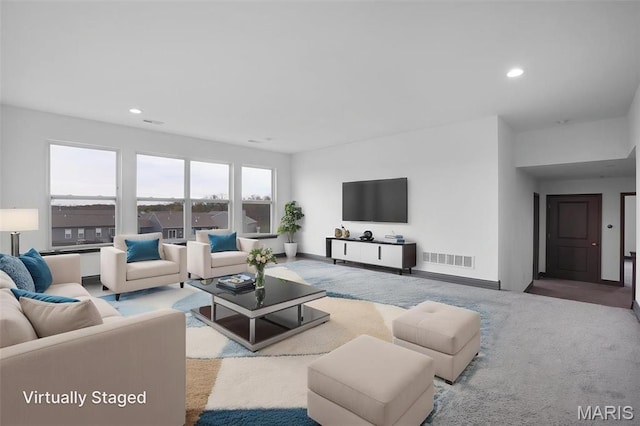 215 Wyndemere Ln, Lake St Louis, MO 63367 - carpeted living area featuring recessed lighting and baseboards