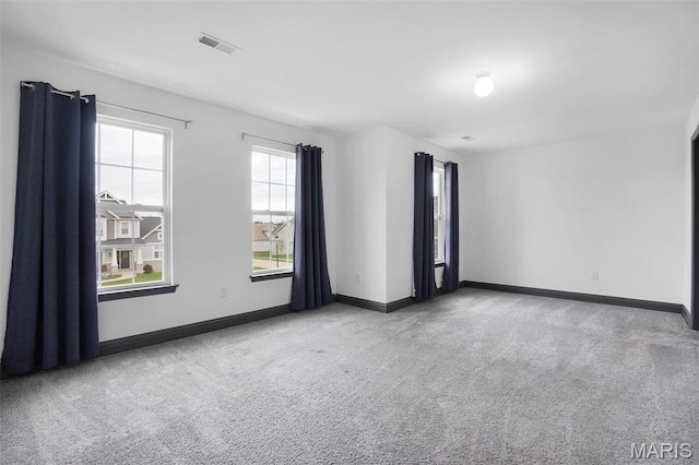 215 Wyndemere Ln, Lake St Louis, MO 63367 - unfurnished room with carpet floors and baseboards