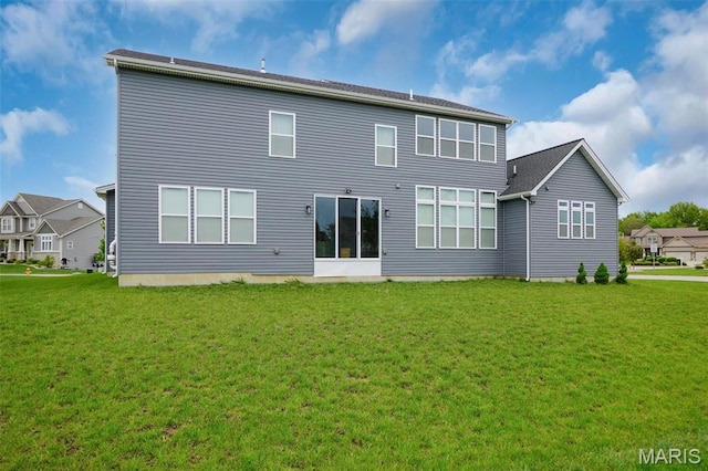 215 Wyndemere Ln, Lake St Louis, MO 63367 - rear view of property featuring a lawn