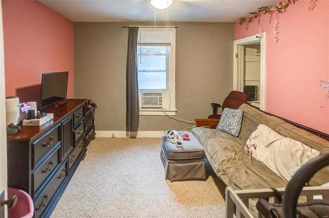 106 N Market St, Waterloo, IL 62298 - living area featuring light colored carpet, cooling unit, and baseboards