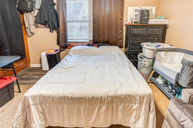 106 N Market St, Waterloo, IL 62298 - bedroom featuring baseboards and wood finished floors