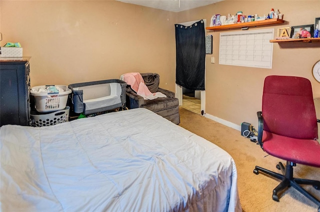 106 N Market St, Waterloo, IL 62298 - carpeted bedroom featuring baseboards