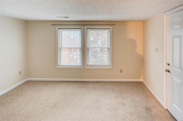 106 N Market St, Waterloo, IL 62298 - empty room with light carpet and baseboards