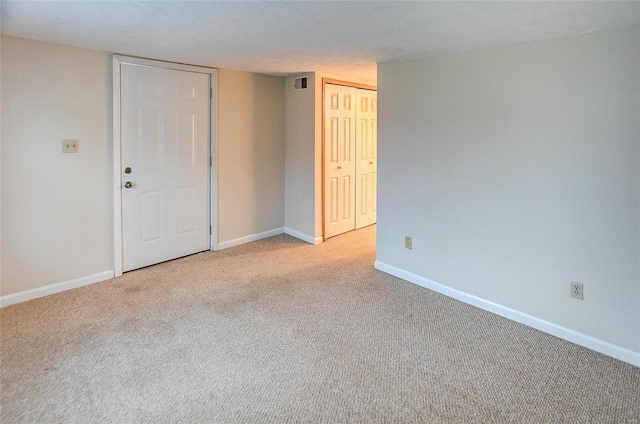 106 N Market St, Waterloo, IL 62298 - unfurnished room with light carpet and baseboards