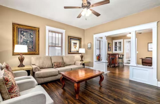 1116 Olive St, Saint Charles, MO 63301 - living area with ceiling fan and dark wood-style floors