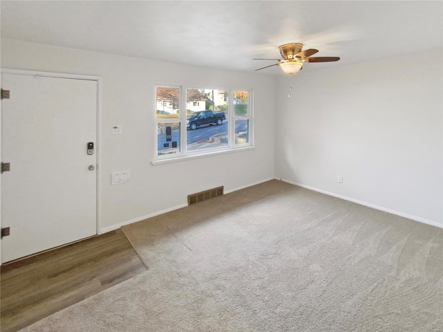 6448 Clifton Hills Dr, Saint Louis, MO 63139 - carpeted empty room featuring a ceiling fan and baseboards