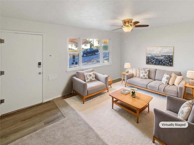 6448 Clifton Hills Dr, Saint Louis, MO 63139 - living area featuring ceiling fan, wood finished floors, and baseboards