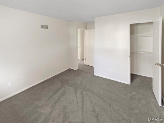 6448 Clifton Hills Dr, Saint Louis, MO 63139 - unfurnished bedroom with carpet floors, a closet, and a spacious closet