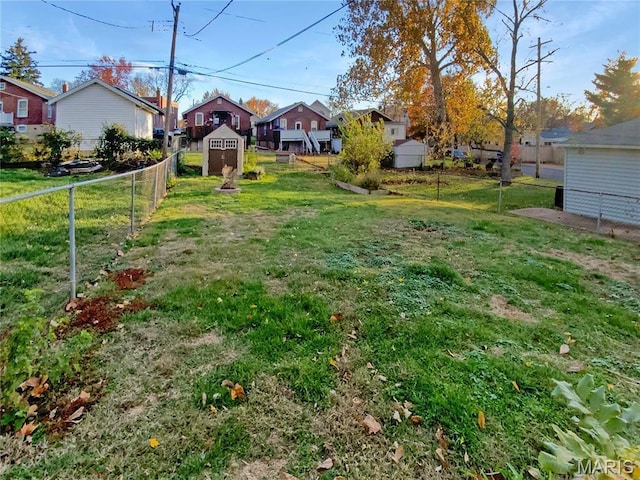 6448 Clifton Hills Dr, Saint Louis, MO 63139 - view of yard featuring a storage unit and a residential view