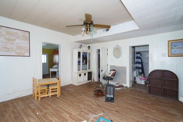 212 N Main St, Licking, MO 65542 - living room featuring wood finished floors and a ceiling fan