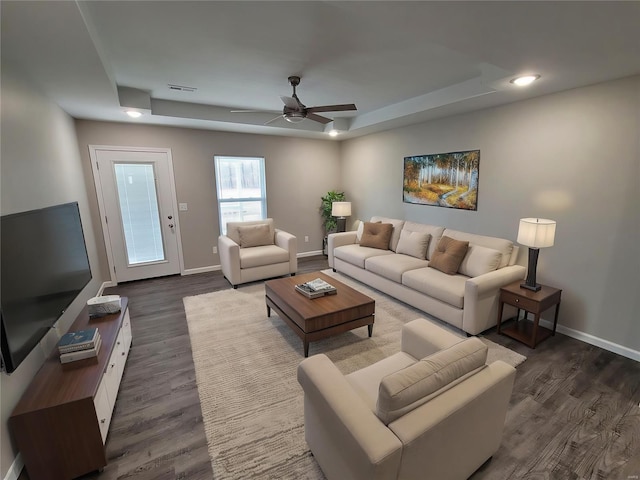 344 Rolling Knoll Rd, Washington, MO 63090 - living room featuring a raised ceiling, dark wood-type flooring, a ceiling fan, baseboards, and recessed lighting