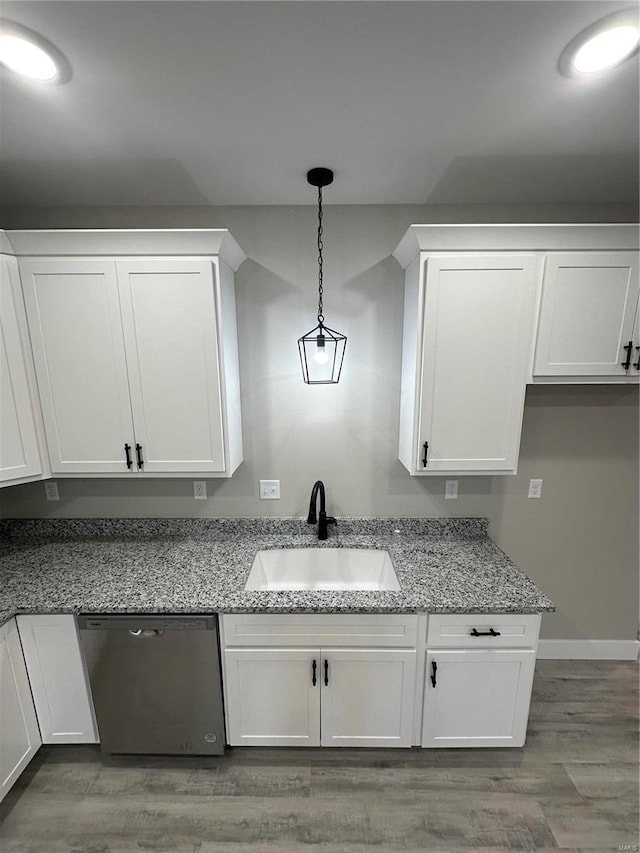 344 Rolling Knoll Rd, Washington, MO 63090 - kitchen with dishwasher, a sink, white cabinetry, light stone counters, and pendant lighting