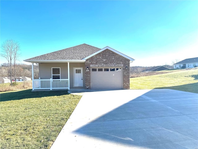 344 Rolling Knoll Rd, Washington, MO 63090 - ranch-style house featuring covered porch, an attached garage, concrete driveway, and a front yard