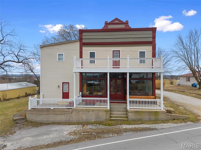 16683 Mill Rd, Marthasville, MO 63357 - view of front of home featuring a balcony and a sunroom