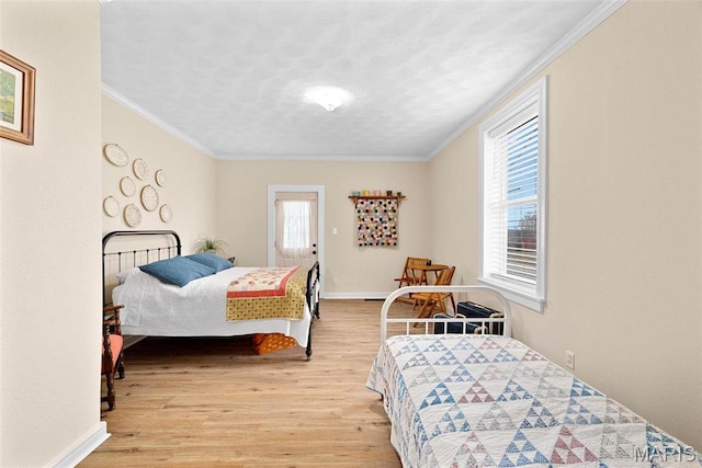 16683 Mill Rd, Marthasville, MO 63357 - bedroom with wood finished floors, multiple windows, and ornamental molding