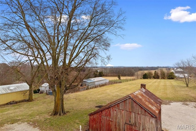 16683 Mill Rd, Marthasville, MO 63357 - view of grassy yard featuring an outbuilding, a pole building, and a rural view