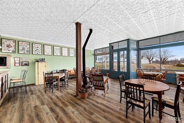 16683 Mill Rd, Marthasville, MO 63357 - dining room featuring wood finished floors, an ornate ceiling, and floor to ceiling windows