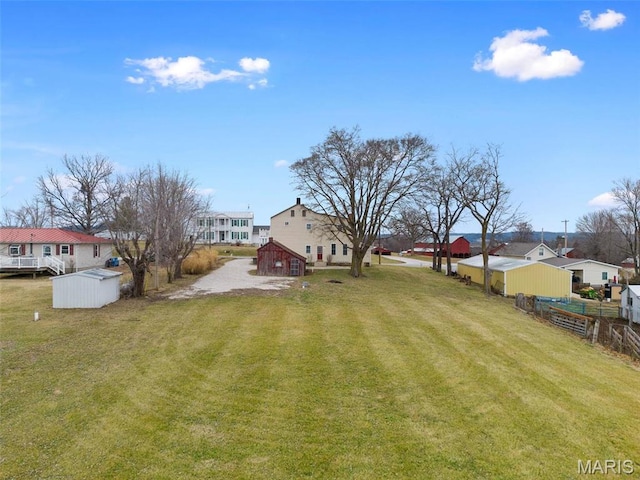 16683 Mill Rd, Marthasville, MO 63357 - view of yard with an outdoor structure, a residential view, and a barn