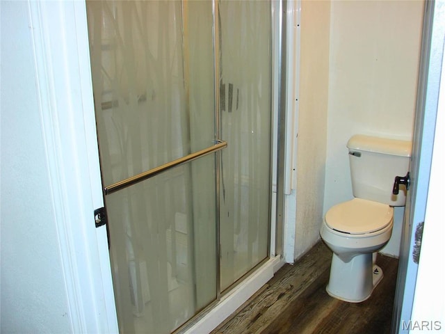 715 W Broadway, Sparta, IL 62288 - bathroom with wood finished floors and a stall shower