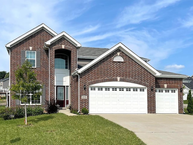 2 Nottingham At, Highlands, Rolla, MO 65401 - traditional home featuring brick siding, driveway, a garage, a front yard, and roof with shingles