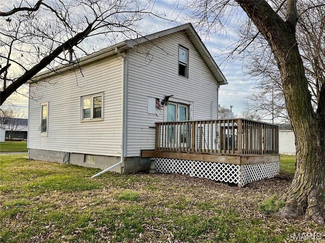 209 Mcgill St, Jerseyville, IL 62052 - rear view of property with a deck and a yard