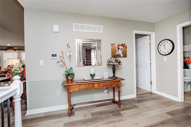 213 Kimberly Ct, Washington, MO 63090 - corridor with light wood-type flooring and baseboards