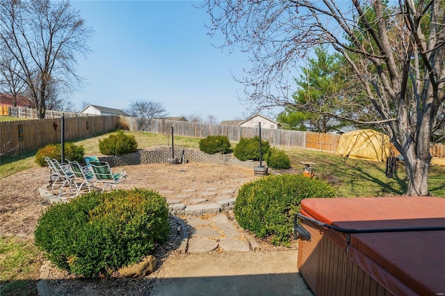 213 Kimberly Ct, Washington, MO 63090 - fenced backyard featuring a hot tub and a patio