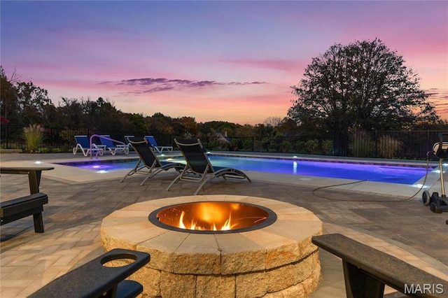 1824 Topping Rd, Saint Louis, MO 63131 - view of pool with a fire pit, fence, and a patio