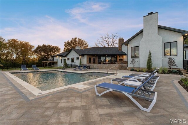 1824 Topping Rd, Saint Louis, MO 63131 - outdoor pool with a patio area