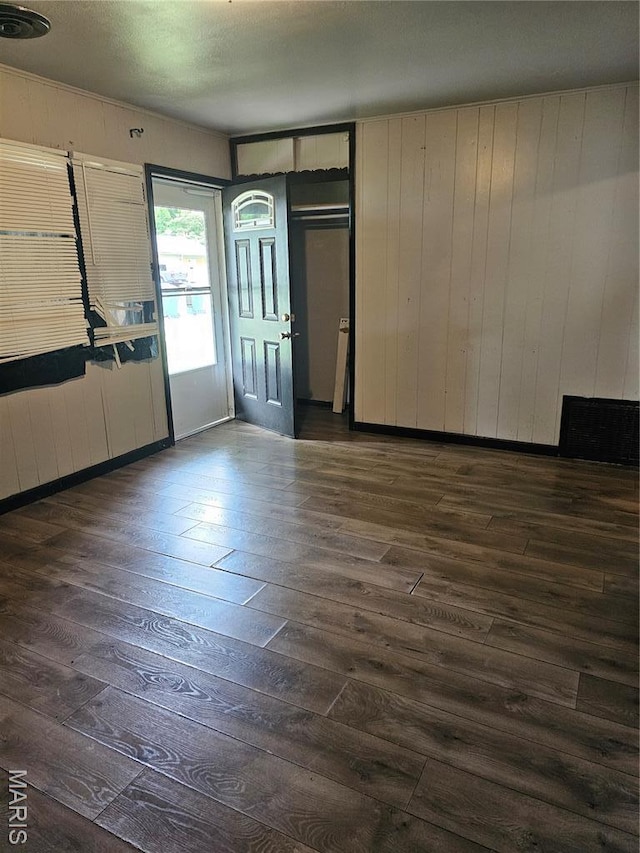 12 Agnes Dr, Cahokia, IL 62206 - foyer entrance featuring dark wood-type flooring and wooden walls