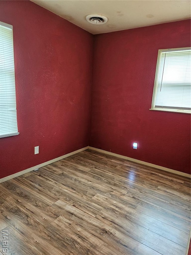 12 Agnes Dr, Cahokia, IL 62206 - unfurnished room featuring wood finished floors