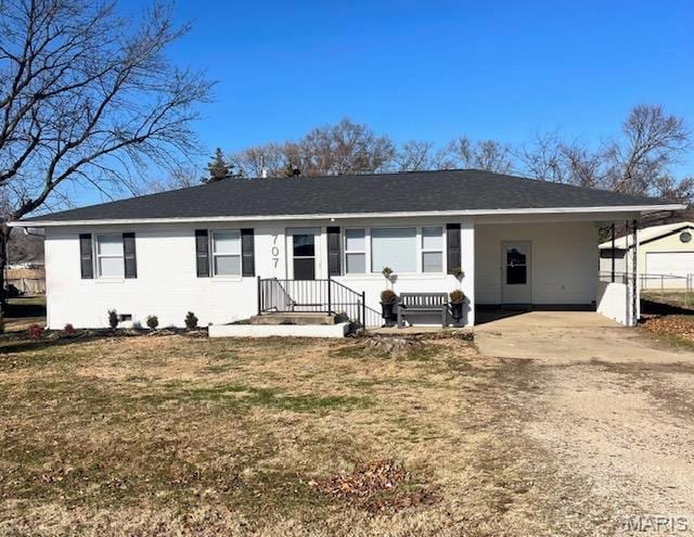 707 W Duckett, Advance, MO 63730 - single story home with driveway, a carport, a front yard, and roof with shingles