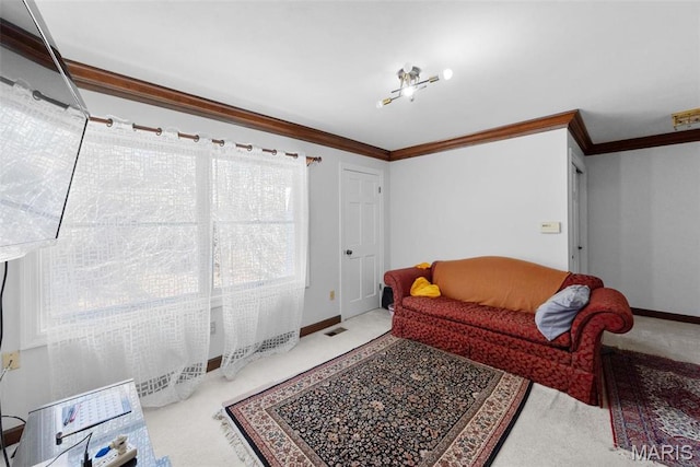 carpeted living room with ornamental molding and baseboards