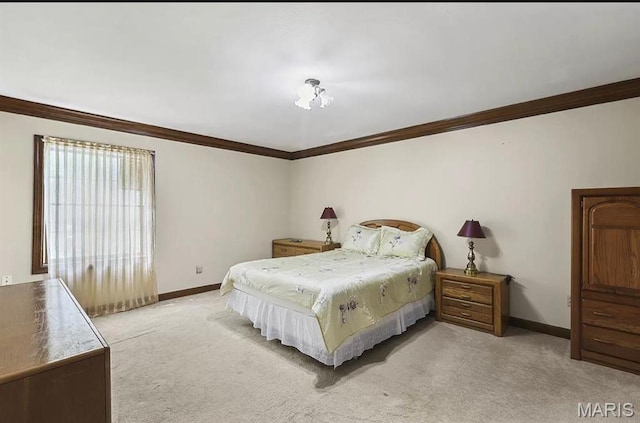 bedroom featuring ornamental molding, light carpet, and baseboards