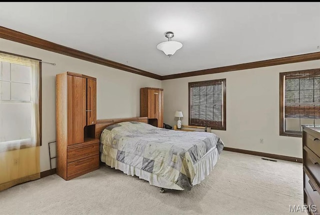 bedroom featuring light carpet, baseboards, and ornamental molding