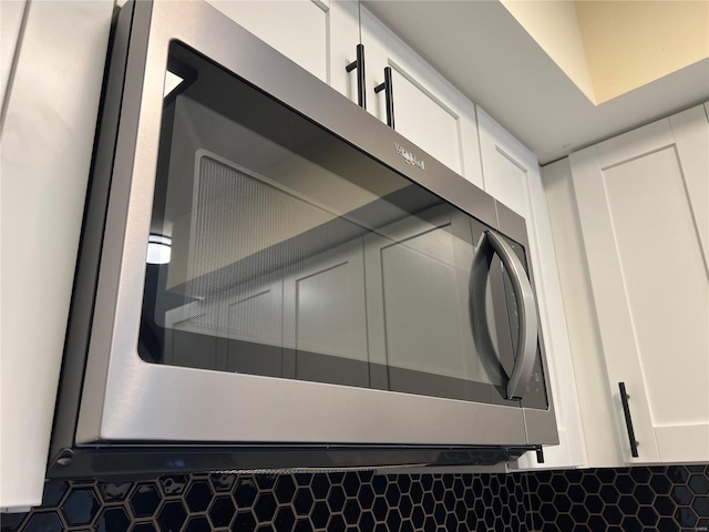 7100 Lexington Ave, Saint Louis, MO 63121 - detailed view of stainless steel microwave