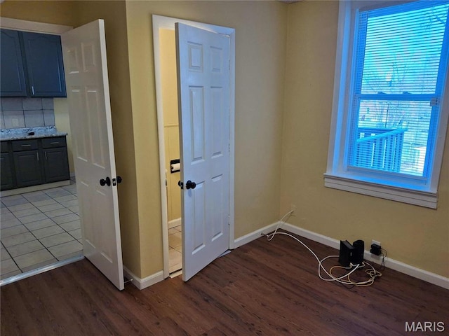 2709 Keokuk St, Saint Louis, MO 63118 - unfurnished room featuring wood finished floors and baseboards