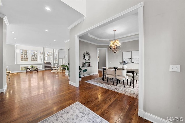 244 US Dr, Wentzville, MO 63385 - foyer featuring ornamental molding, wood finished floors, baseboards, a chandelier, and stairs