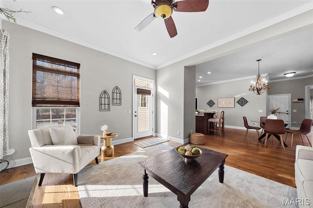 244 US Dr, Wentzville, MO 63385 - living area featuring recessed lighting, wood finished floors, baseboards, crown molding, and a chandelier