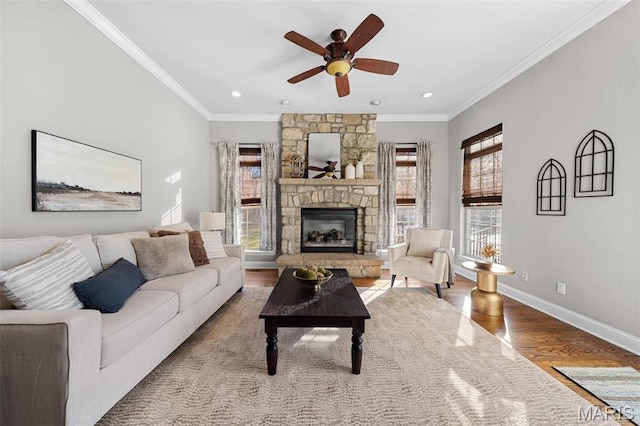 244 US Dr, Wentzville, MO 63385 - living area with a ceiling fan, wood finished floors, ornamental molding, a fireplace, and baseboards