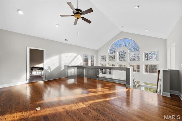 244 US Dr, Wentzville, MO 63385 - unfurnished living room with ceiling fan, wood finished floors, and high vaulted ceiling
