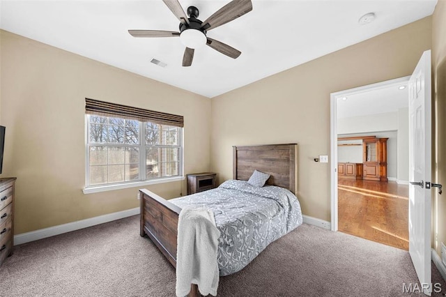 244 US Dr, Wentzville, MO 63385 - bedroom with carpet flooring, baseboards, and a ceiling fan